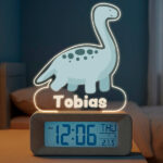 Miniaturansicht von Dino-Wecker mit Licht und personalisiertem Namen